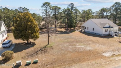Build Your Dream Home on the Seventh Hole of Harbour Pointe Golf on Harbour Point Golf Club in North Carolina - for sale on GolfHomes.com, golf home, golf lot
