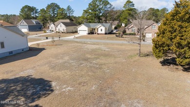 Build Your Dream Home on the Seventh Hole of Harbour Pointe Golf on Harbour Point Golf Club in North Carolina - for sale on GolfHomes.com, golf home, golf lot