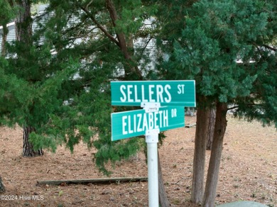 Build your beach house on this lovely lot with marsh views and on Oak Island Golf Club in North Carolina - for sale on GolfHomes.com, golf home, golf lot