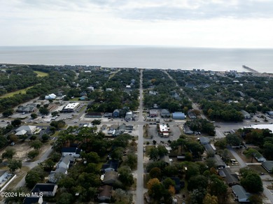 Build your beach house on this lovely lot with marsh views and on Oak Island Golf Club in North Carolina - for sale on GolfHomes.com, golf home, golf lot