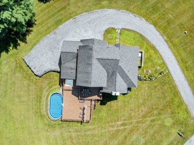 Immaculately maintained 4-bedroom, 5  1/2 -bath contemporary on Stowe Country Club in Vermont - for sale on GolfHomes.com, golf home, golf lot