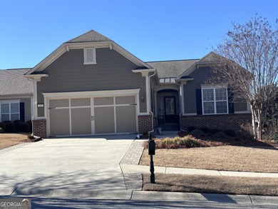 Welcome to this beautifully maintained home in the highly on Canongate Golf At Sun City Peachtree in Georgia - for sale on GolfHomes.com, golf home, golf lot