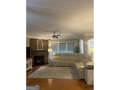 Welcome to this beautifully maintained home in the highly on Canongate Golf At Sun City Peachtree in Georgia - for sale on GolfHomes.com, golf home, golf lot