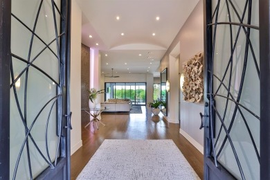 This custom-built contemporary masterpiece exudes refined on Mira Vista Country Club in Texas - for sale on GolfHomes.com, golf home, golf lot