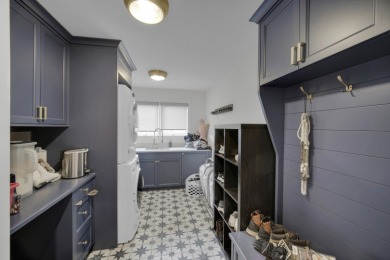 Nestled in the heart of White Eagle Club, this fully renovated on White Eagle Golf Club in Illinois - for sale on GolfHomes.com, golf home, golf lot