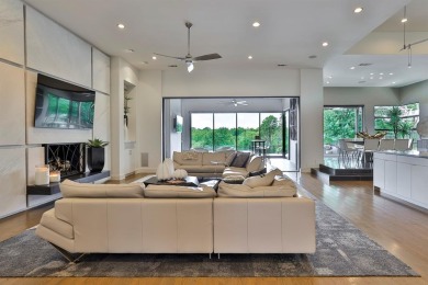 This custom-built contemporary masterpiece exudes refined on Mira Vista Country Club in Texas - for sale on GolfHomes.com, golf home, golf lot