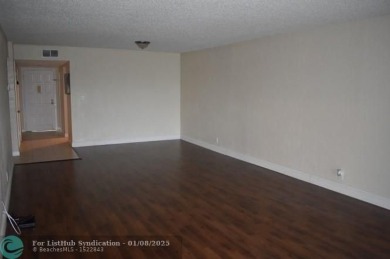 LOVELY CONDO IN QUIET ALL AGES GATED COMMUNITY! INVESTOR on Inverrary Country Club in Florida - for sale on GolfHomes.com, golf home, golf lot