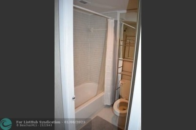 LOVELY CONDO IN QUIET ALL AGES GATED COMMUNITY! INVESTOR on Inverrary Country Club in Florida - for sale on GolfHomes.com, golf home, golf lot