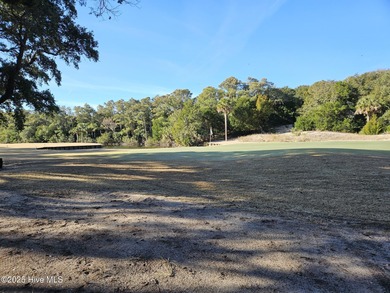 Beautiful golf course homesite with views of the lagoon and on Bald Head Island Golf Club in North Carolina - for sale on GolfHomes.com, golf home, golf lot
