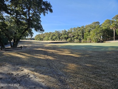 Beautiful golf course homesite with views of the lagoon and on Bald Head Island Golf Club in North Carolina - for sale on GolfHomes.com, golf home, golf lot