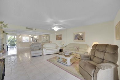 Welcome home to this beautifully renovated 2 bedroom, 2 bathroom on Boca Dunes Golf and Country Club in Florida - for sale on GolfHomes.com, golf home, golf lot