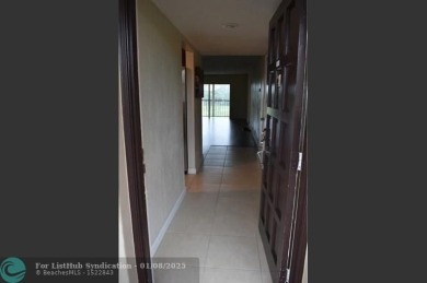 LOVELY CONDO IN QUIET ALL AGES GATED COMMUNITY! INVESTOR on Inverrary Country Club in Florida - for sale on GolfHomes.com, golf home, golf lot
