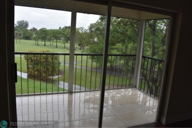 LOVELY CONDO IN QUIET ALL AGES GATED COMMUNITY! INVESTOR on Inverrary Country Club in Florida - for sale on GolfHomes.com, golf home, golf lot