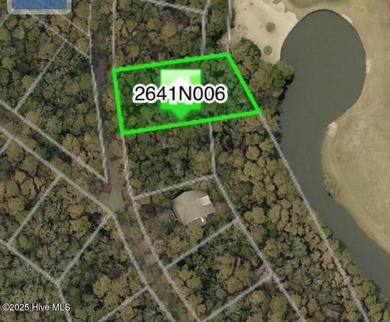 Beautiful golf course homesite with views of the lagoon and on Bald Head Island Golf Club in North Carolina - for sale on GolfHomes.com, golf home, golf lot
