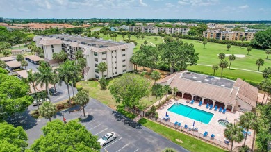 Welcome home to this beautifully renovated 2 bedroom, 2 bathroom on Boca Dunes Golf and Country Club in Florida - for sale on GolfHomes.com, golf home, golf lot