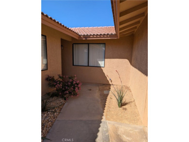 Extremely charming and well taken care of, this two-bedroom on Silver Lakes Golf Course in California - for sale on GolfHomes.com, golf home, golf lot