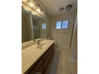Extremely charming and well taken care of, this two-bedroom on Silver Lakes Golf Course in California - for sale on GolfHomes.com, golf home, golf lot