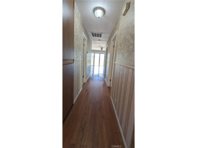 Extremely charming and well taken care of, this two-bedroom on Silver Lakes Golf Course in California - for sale on GolfHomes.com, golf home, golf lot