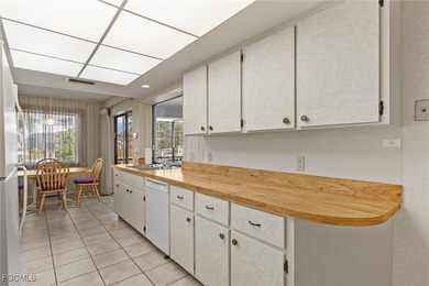 Discover this inviting 3 bedroom, 2 bathroom canalfront home in on Saint Andrews South Golf Club in Florida - for sale on GolfHomes.com, golf home, golf lot