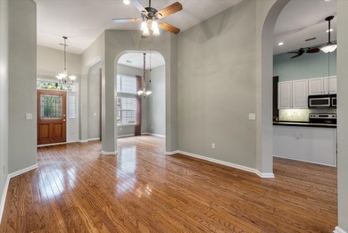 THIS PERFECT GOLF COURSE HOME is framed by majestic trees that on Legend Oaks Plantation Golf Club in South Carolina - for sale on GolfHomes.com, golf home, golf lot