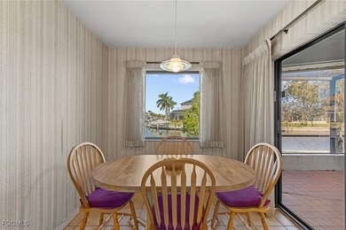 Discover this inviting 3 bedroom, 2 bathroom canalfront home in on Saint Andrews South Golf Club in Florida - for sale on GolfHomes.com, golf home, golf lot