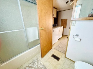 Experience the ultimate combination of comfort and style in this on Hamptons Golf Club in Florida - for sale on GolfHomes.com, golf home, golf lot