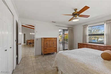 Discover this inviting 3 bedroom, 2 bathroom canalfront home in on Saint Andrews South Golf Club in Florida - for sale on GolfHomes.com, golf home, golf lot