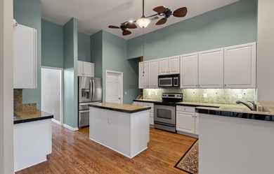 THIS PERFECT GOLF COURSE HOME is framed by majestic trees that on Legend Oaks Plantation Golf Club in South Carolina - for sale on GolfHomes.com, golf home, golf lot