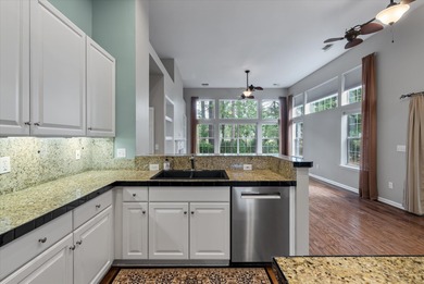 THIS PERFECT GOLF COURSE HOME is framed by majestic trees that on Legend Oaks Plantation Golf Club in South Carolina - for sale on GolfHomes.com, golf home, golf lot