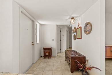 Discover this inviting 3 bedroom, 2 bathroom canalfront home in on Saint Andrews South Golf Club in Florida - for sale on GolfHomes.com, golf home, golf lot