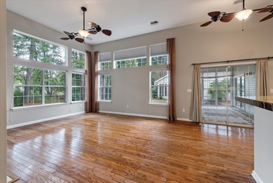 THIS PERFECT GOLF COURSE HOME is framed by majestic trees that on Legend Oaks Plantation Golf Club in South Carolina - for sale on GolfHomes.com, golf home, golf lot
