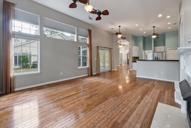 THIS PERFECT GOLF COURSE HOME is framed by majestic trees that on Legend Oaks Plantation Golf Club in South Carolina - for sale on GolfHomes.com, golf home, golf lot