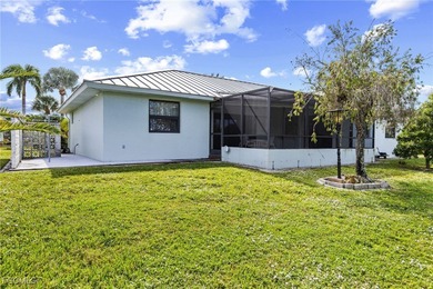 Discover this inviting 3 bedroom, 2 bathroom canalfront home in on Saint Andrews South Golf Club in Florida - for sale on GolfHomes.com, golf home, golf lot