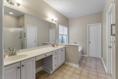 THIS PERFECT GOLF COURSE HOME is framed by majestic trees that on Legend Oaks Plantation Golf Club in South Carolina - for sale on GolfHomes.com, golf home, golf lot