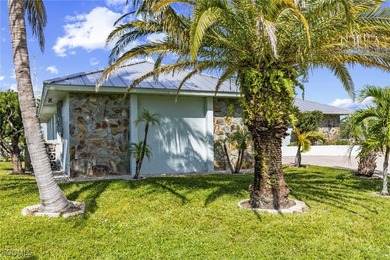 Discover this inviting 3 bedroom, 2 bathroom canalfront home in on Saint Andrews South Golf Club in Florida - for sale on GolfHomes.com, golf home, golf lot