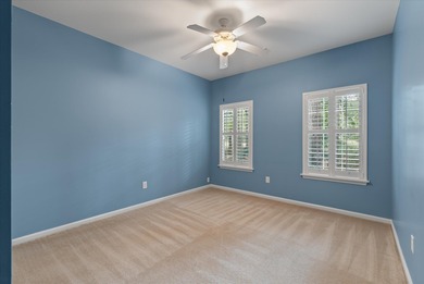 THIS PERFECT GOLF COURSE HOME is framed by majestic trees that on Legend Oaks Plantation Golf Club in South Carolina - for sale on GolfHomes.com, golf home, golf lot