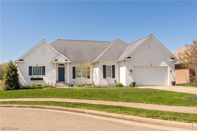 This beautifully maintained 3-bedroom, 3-bath ranch backs on Oak Shadows Golf Club in Ohio - for sale on GolfHomes.com, golf home, golf lot