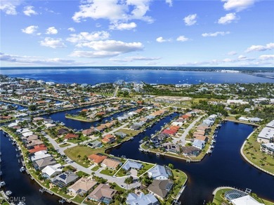 Discover this inviting 3 bedroom, 2 bathroom canalfront home in on Saint Andrews South Golf Club in Florida - for sale on GolfHomes.com, golf home, golf lot