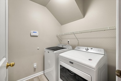 THIS PERFECT GOLF COURSE HOME is framed by majestic trees that on Legend Oaks Plantation Golf Club in South Carolina - for sale on GolfHomes.com, golf home, golf lot