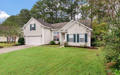 THIS PERFECT GOLF COURSE HOME is framed by majestic trees that on Legend Oaks Plantation Golf Club in South Carolina - for sale on GolfHomes.com, golf home, golf lot