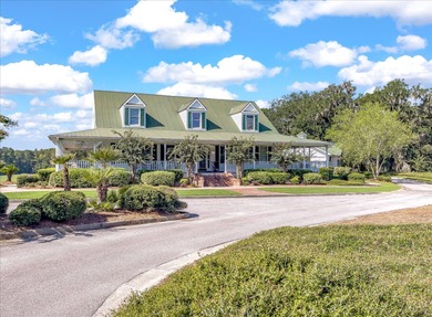 THIS PERFECT GOLF COURSE HOME is framed by majestic trees that on Legend Oaks Plantation Golf Club in South Carolina - for sale on GolfHomes.com, golf home, golf lot