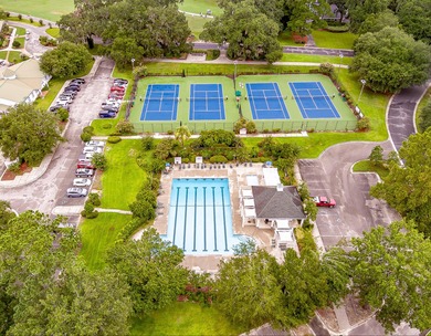 THIS PERFECT GOLF COURSE HOME is framed by majestic trees that on Legend Oaks Plantation Golf Club in South Carolina - for sale on GolfHomes.com, golf home, golf lot