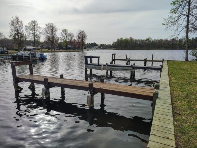 Pristine Custom Built Open Floorplan Home on double lot with on Players Course At Wyboo Plantation in South Carolina - for sale on GolfHomes.com, golf home, golf lot