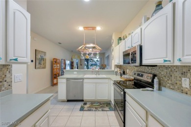 CHARMING WESTERN EXPOSURE 2-BEDROOM VILLA WITH STUNNING LAKE on Herons Glen Golf and Country Club in Florida - for sale on GolfHomes.com, golf home, golf lot