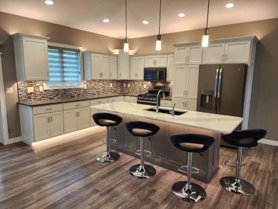 Beautiful Golf Course Retreat on .62 Acres - Move-In Ready on The Ridge Golf Club in Iowa - for sale on GolfHomes.com, golf home, golf lot