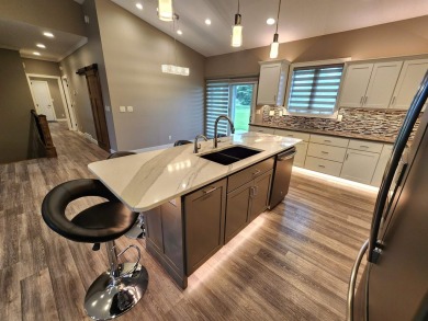 Beautiful Golf Course Retreat on .62 Acres - Move-In Ready on The Ridge Golf Club in Iowa - for sale on GolfHomes.com, golf home, golf lot