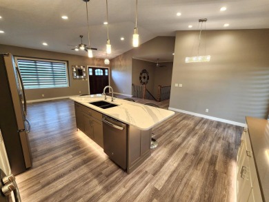 Beautiful Golf Course Retreat on .62 Acres - Move-In Ready on The Ridge Golf Club in Iowa - for sale on GolfHomes.com, golf home, golf lot
