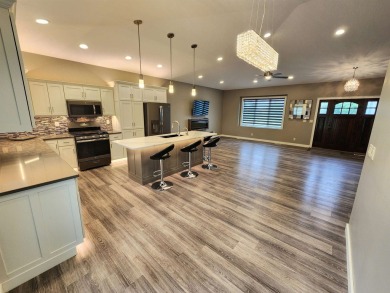 Beautiful Golf Course Retreat on .62 Acres - Move-In Ready on The Ridge Golf Club in Iowa - for sale on GolfHomes.com, golf home, golf lot