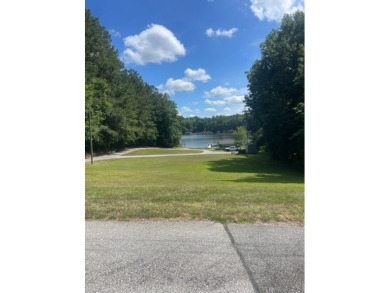 Welcome to your affordable lakefront retreat! This pristine lot on Lake Gaston Golf Club in Virginia - for sale on GolfHomes.com, golf home, golf lot