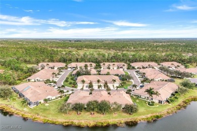 CHARMING WESTERN EXPOSURE 2-BEDROOM VILLA WITH STUNNING LAKE on Herons Glen Golf and Country Club in Florida - for sale on GolfHomes.com, golf home, golf lot